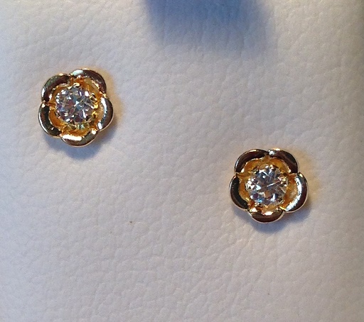 New Flower Design Earrings with Cubic Z Center 
Available in 14kt White or Yellow Gold
With Screw Backs.